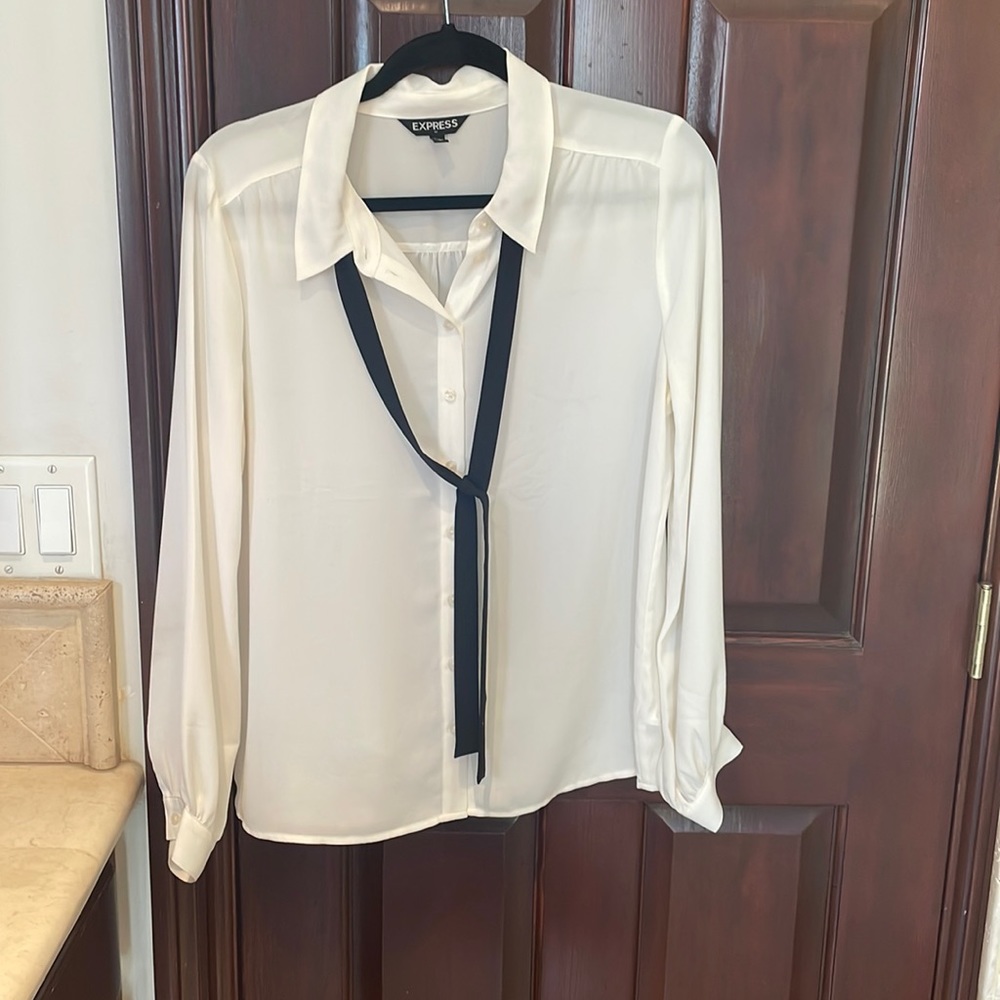 White, long sleeve blouse with black tie